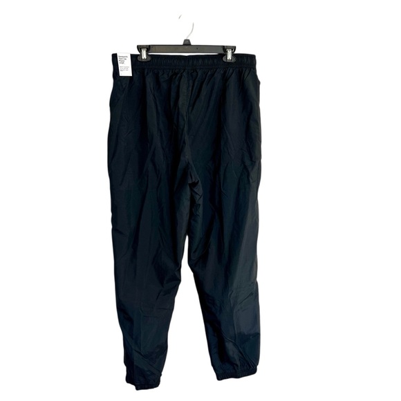 NWT Men’s Nike woven nylon tapered track pants standard fit sz XXL black active - Picture 3 of 14